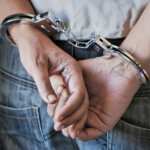 juvenile person about to be arrested and is in handcuffs in washington, virginia
